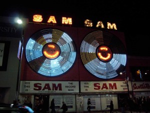 Photo, “sam the record man” is copyright (c) 2009 Paul Joseph and made available under an Attribution 2.0 Generic license. 